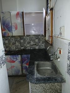 Kitchen Image of 650 Sq.ft 2 BHK Builder Floor for rent in Sector 11 Rohini New Delhi for Rs. 23000