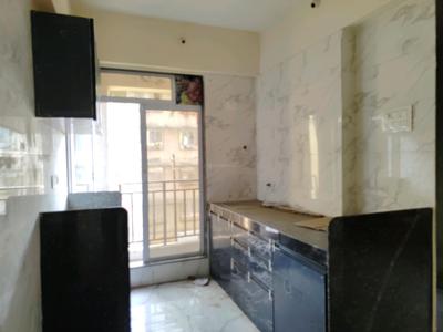 Kitchen Image of 695 Sq.ft 2 BHK Apartment / Flat for sale in Mansarovar Pearl Gardens, Vasai West Vasai for Rs. 7400000