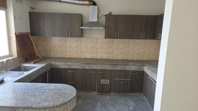 Kitchen Image of 1500 Sq.ft 2 BHK Apartment / Flat for rent in Raheja Vedaanta, Sector 108 Gurgaon for Rs. 32000