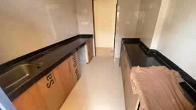 Kitchen Image of 860 Sq.ft 2 BHK Apartment / Flat for rent in Naman Platina, Taloja Navi Mumbai for Rs. 17000