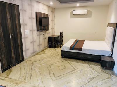 Bedroom Image of Urbanroomz Luxury Coliving PG UnitechCyberPark in Sector 46, Gurgaon