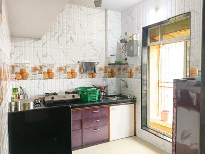 Kitchen Image of 900 Sq.ft 2 BHK Apartment / Flat for sale in Happy Home Sarvoday Swaroop, Dombivli East Thane for Rs. 6900000