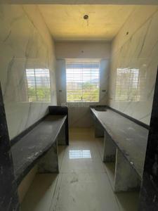 Kitchen Image of 939 Sq.ft 2 BHK Apartment / Flat for sale in Mohan Willows III, Badlapur East Badlapur for Rs. 4000000