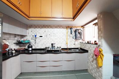 Kitchen Image of 1620 Sq.ft 4 BHK Independent House for sale in Ghatlodiya Ahmedabad for Rs. 23000000