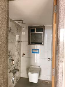 Common Bathroom Image of 735 Sq.ft 1 BHK Apartment / Flat for sale in Mangeshi Dhara, Thakurli Thane for Rs. 5500000
