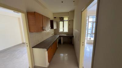 Kitchen Image of 1050 Sq.ft 2 BHK Apartment / Flat for rent in Gaurs Gaur Global Village, Crossings Republik Ghaziabad for Rs. 18000