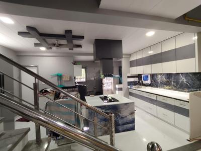 Kitchen Image of Samarth PG in Piplod, Surat