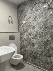 Common Bathroom Image of 1050 Sq.ft 2 BHK Apartment / Flat for sale in Vihaan Wardania, Noida Extension Greater Noida for Rs. 4499999