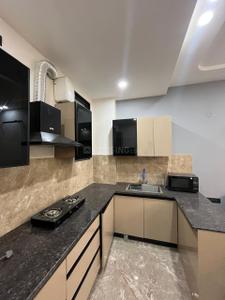 Kitchen Image of 650 Sq.ft 1 BHK Builder Floor for rent in Sector 52A Gurgaon for Rs. 45000