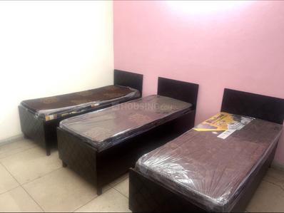 Bedroom Image of DHANKUS GIRLS PG  in Sector 16A, Noida