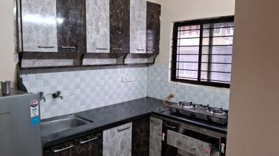 Kitchen Image of 650 Sq.ft 1 BHK Apartment / Flat for rent in Shri Charbhuja Nath Charbhuja Nath Om Heights, Rajendra Nagar Indore for Rs. 15000
