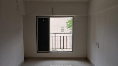 Living Room Image of 650 Sq.ft 2 BHK Apartment / Flat for sale in DGS Sheetal Tapovan, Malad East Mumbai for Rs. 15000000