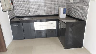Kitchen Image of 1000 Sq.ft 2 BHK Apartment / Flat for sale in Gagan Micasaa, Wagholi Pune for Rs. 6200000