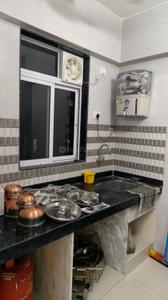 Kitchen Image of Navkar Living  in Ulhasnagar, Thane