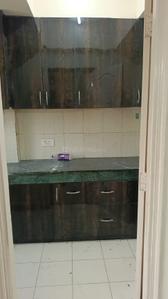 Kitchen Image of 959 Sq.ft 2 BHK Apartment / Flat for rent in Paras Tierea, Sector 137 Noida for Rs. 22000
