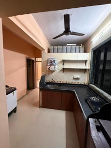 Kitchen Image of 910 Sq.ft 2 BHK Builder Floor for rent in Airoli Navi Mumbai for Rs. 36000