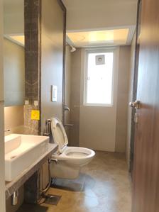 Common Bathroom Image of 1023 Sq.ft 3 BHK Apartment / Flat for sale in Kolte Patil Alora, Santacruz East Mumbai for Rs. 39000000
