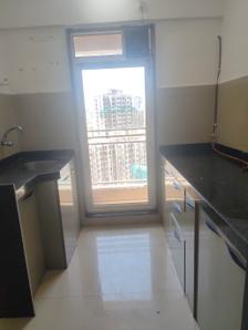 Kitchen Image of 500 Sq.ft 1 BHK Apartment / Flat for sale in JP North Elara, Mira Road East Mira Bhayandar for Rs. 7000000