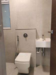 Common Bathroom Image of 710 Sq.ft 2 BHK Apartment / Flat for sale in Dotom Isle , Kandivali West Mumbai for Rs. 14100000