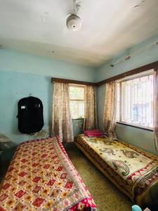 Bedroom Image of PG FOR BOYS NEAR VILE PARLE STATION in Vile Parle West, Mumbai