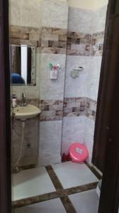 Bathroom Image of 900 Sq.ft 1 BHK Apartment / Flat for rent in Kirari Suleman Nagar New Delhi for Rs. 15000