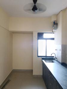 Kitchen Image of 522 Sq.ft 1 BHK Apartment / Flat for rent in Raunak Unnathi Woods, Kasarvadavali Thane for Rs. 16000