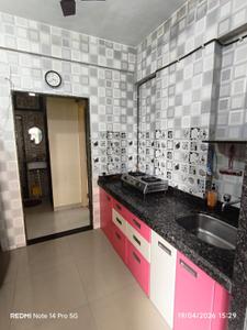 Kitchen Image of 645 Sq.ft 1 BHK Apartment / Flat for rent in Sai Trilok Heights, Thakurli Thane for Rs. 16000