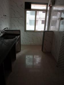 Kitchen Image of 1050 Sq.ft 2 BHK Apartment / Flat for rent in Mohan Highlands, Badlapur East Badlapur for Rs. 10500