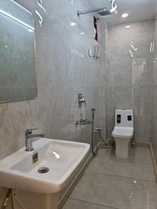 Common Bathroom Image of 810 Sq.ft 3 BHK Apartment / Flat for sale in Dwarka Mor New Delhi for Rs. 5500000