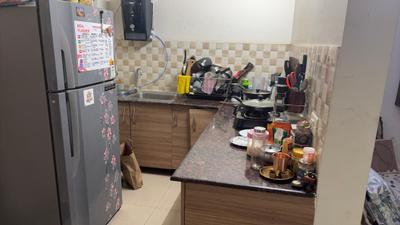 Kitchen Image of 1010 Sq.ft 2 BHK Apartment / Flat for sale in Gaurs 11th Avenue, Noida Extension Greater Noida for Rs. 8700000