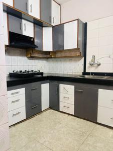 Kitchen Image of 973 Sq.ft 2 BHK Apartment / Flat for rent in Unitech Uniworld Gardens 2, Sector 47 Gurgaon for Rs. 35000