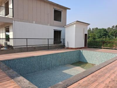 Swimming Pool Image of 1550 Sq.ft 4 BHK Villa for sale in Dkrrish Green Beauty Farms, Kidawali Noida for Rs. 9200000