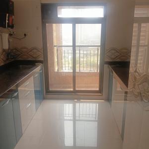 Kitchen Image of 1005 Sq.ft 2 BHK Apartment / Flat for rent in Shilphata Thane for Rs. 18000