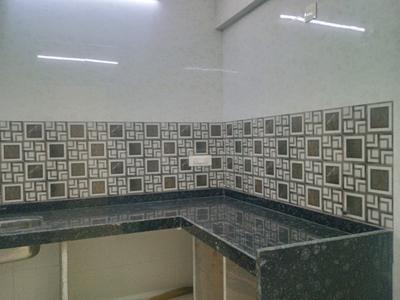 Kitchen Image of 950 Sq.ft 2 BHK Apartment / Flat for sale in Titwala Thane for Rs. 3600000