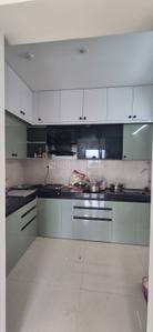 Kitchen Image of 1055 Sq.ft 2 BHK Apartment / Flat for rent in Shapoorji Pallonji Joyville Sensorium, Maan Pune for Rs. 27988