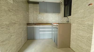 Kitchen Image of 610 Sq.ft 1 BHK Apartment / Flat for sale in Kalwa Thane for Rs. 6800000