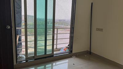 Balcony Image of 690 Sq.ft 1 BHK Apartment / Flat for rent in Gajra Bhoomi Gardenia, Kalamboli Navi Mumbai for Rs. 16000