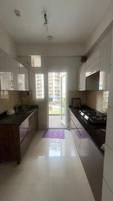 Kitchen Image of 1000 Sq.ft 2 BHK Apartment / Flat for rent in Arihant Ambar, Noida Extension Greater Noida for Rs. 25000
