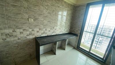 Kitchen Image of 1000 Sq.ft 2 BHK Apartment / Flat for rent in Kamdhenu Aura, Taloja Navi Mumbai for Rs. 23000