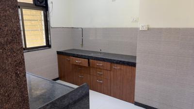 Kitchen Image of 884 Sq.ft 2 BHK Apartment / Flat for sale in ACME Dandelia, Thane West Thane for Rs. 14700000