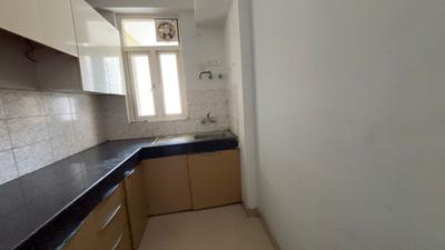 Kitchen Image of 930 Sq.ft 2 BHK Apartment / Flat for rent in Habitech Panchtatva Phase 1, Noida Extension Greater Noida for Rs. 16980