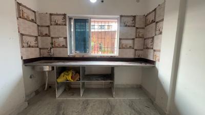 Kitchen Image of 720 Sq.ft 2 BHK Apartment / Flat for sale in Behala Kolkata for Rs. 3300000
