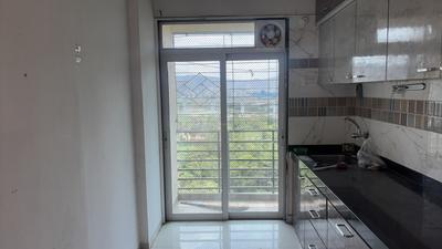 Kitchen Image of 800 Sq.ft 2 BHK Apartment / Flat for rent in Om Paraiso, Mothi Desai Gaon Thane for Rs. 21000