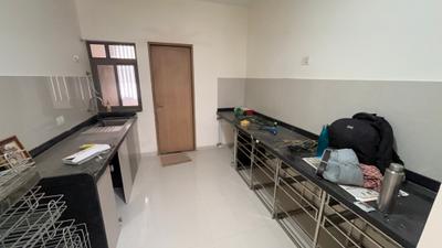Kitchen Image of 1100 Sq.ft 2 BHK Apartment / Flat for rent in Skyi Songbirds , Bhugaon Pune for Rs. 28000