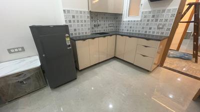 Kitchen Image of 1000 Sq.ft 1 BHK Builder Floor for rent in Sector 14 Gurgaon for Rs. 32000