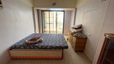 Bedroom Image of 550 Sq.ft 1 BHK Apartment / Flat for sale in Suyash Tower, Kopar Khairane Navi Mumbai for Rs. 10000001