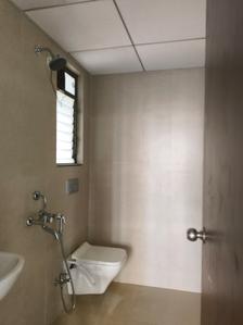 Common Bathroom Image of 714 Sq.ft 2 BHK Apartment / Flat for rent in Runwal My City Phase II Cluster 05 Part II, Usarghar Thane for Rs. 12999