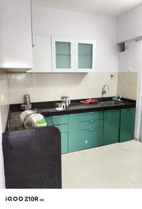 Kitchen Image of 1000 Sq.ft 2 BHK Apartment / Flat for rent in Mantra Montana, Dhanori Pune for Rs. 25000