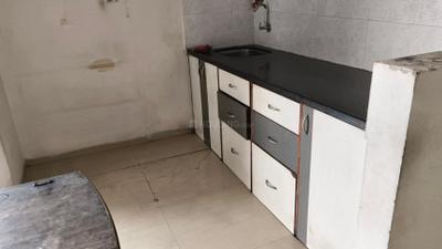 Kitchen Image of 650 Sq.ft 1 BHK Apartment / Flat for rent in Pride Paradise Apartment, Kamothe Navi Mumbai for Rs. 20000