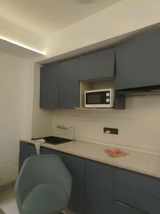 Kitchen Image of 600 Sq.ft 1 BHK Builder Floor for rent in Sector 57 Gurgaon for Rs. 35000